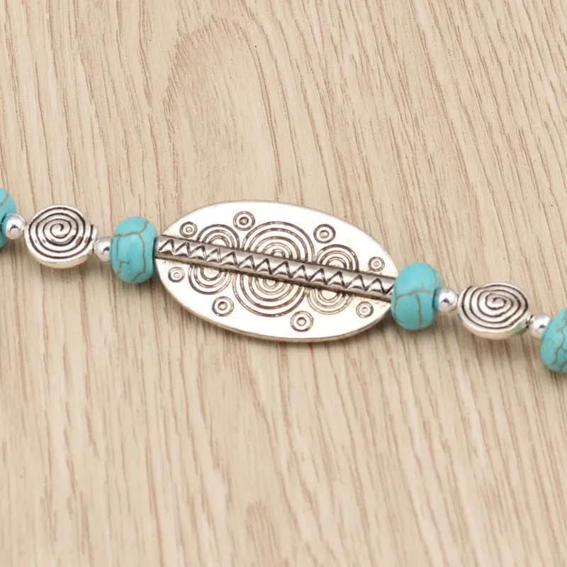 Carved Oblong and Turquoise Bead