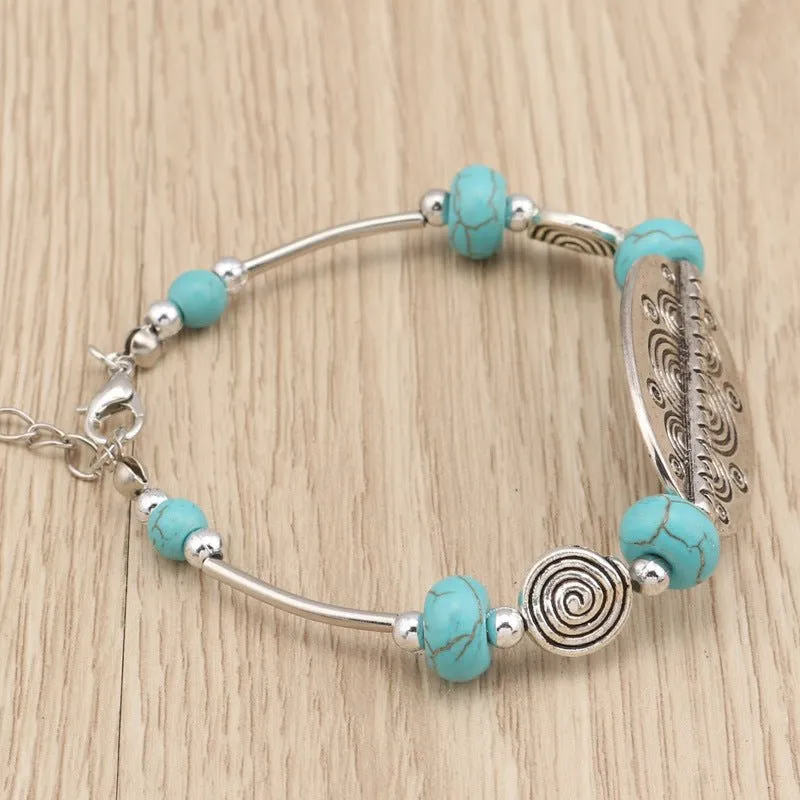 Carved Oblong and Turquoise Bead